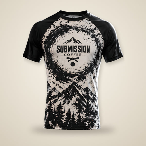 Submission Coffee Mountain Rash Guard, front view, cream body with black raglan sleeves and brush-stroke mountain art